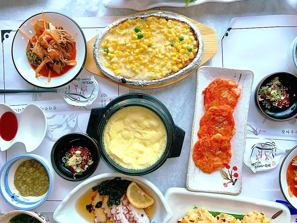 Table spread of warm side dishes