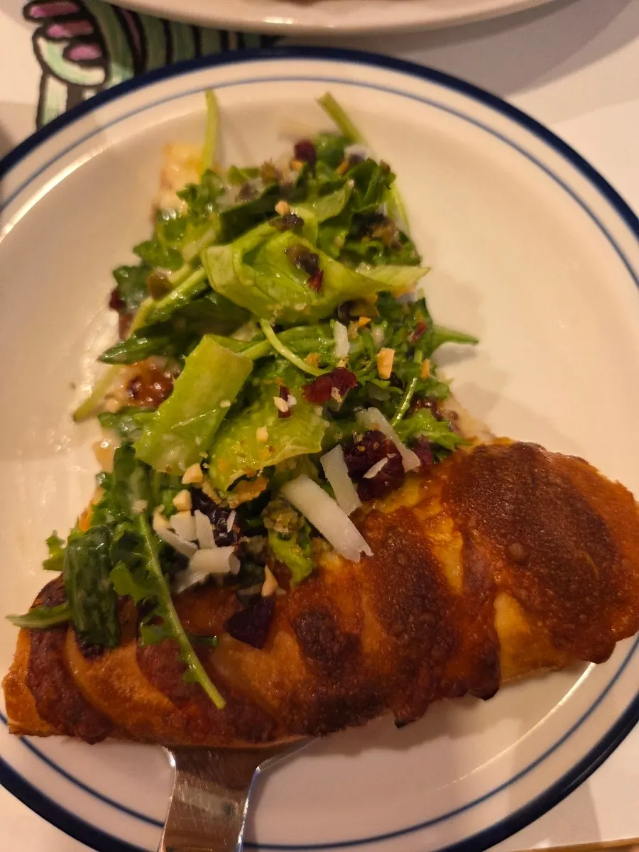 Salad pizza with cranberries and nuts
