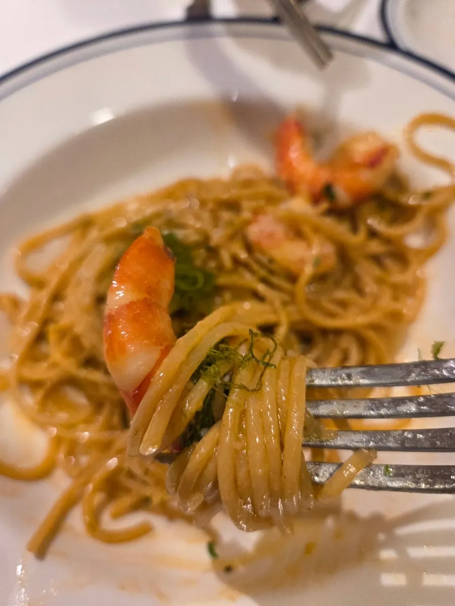 A meal of pizza and pasta