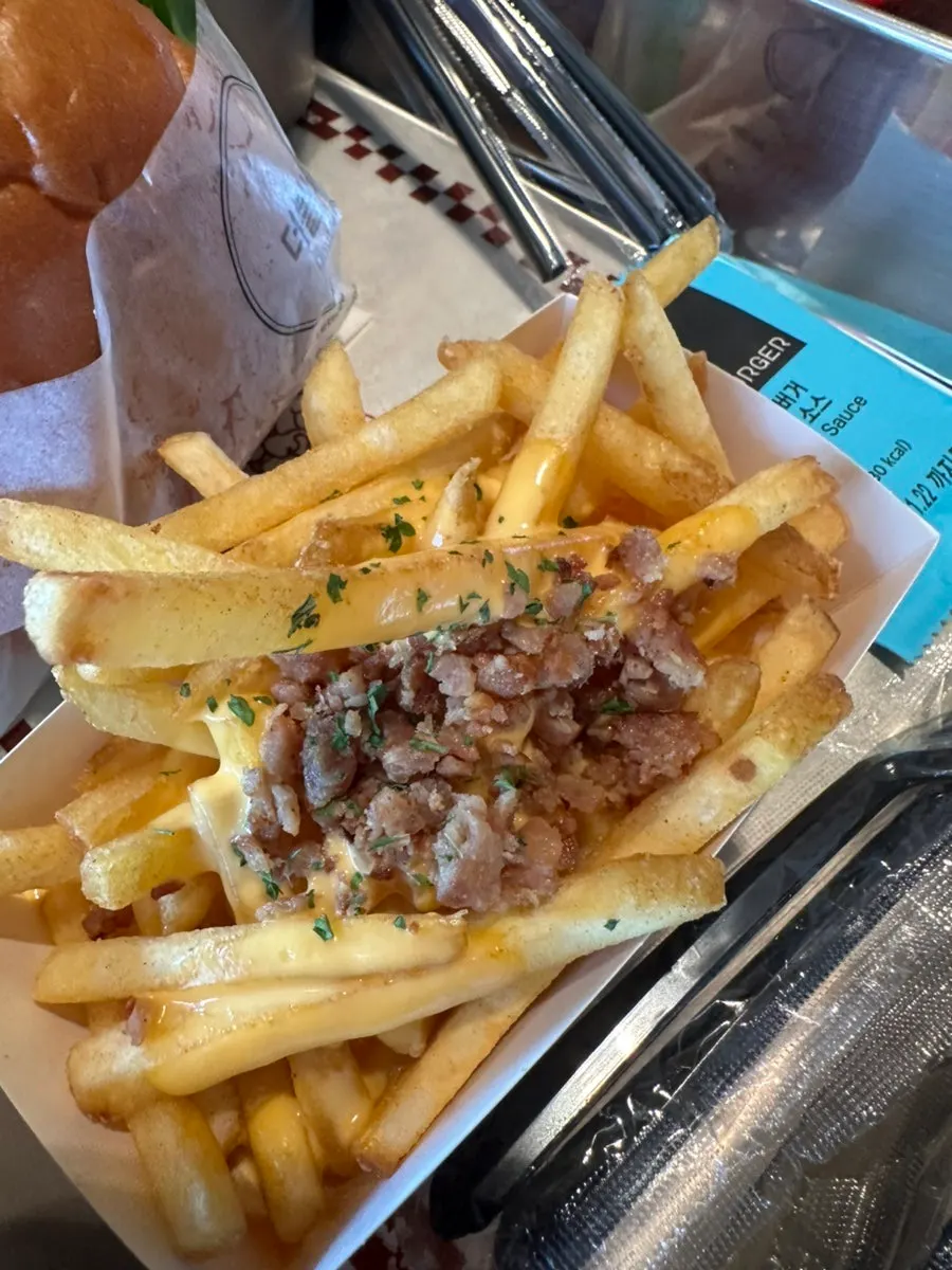 Inside of the shrimp burger showing grilled onion