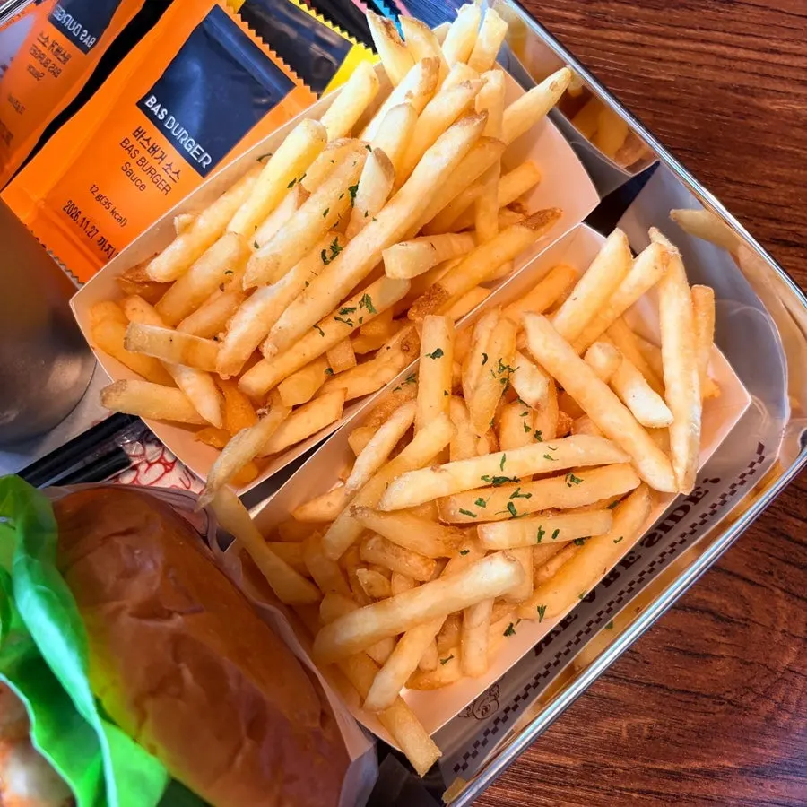 Cups of house, mentaiko mayo, BBQ, and other sauces