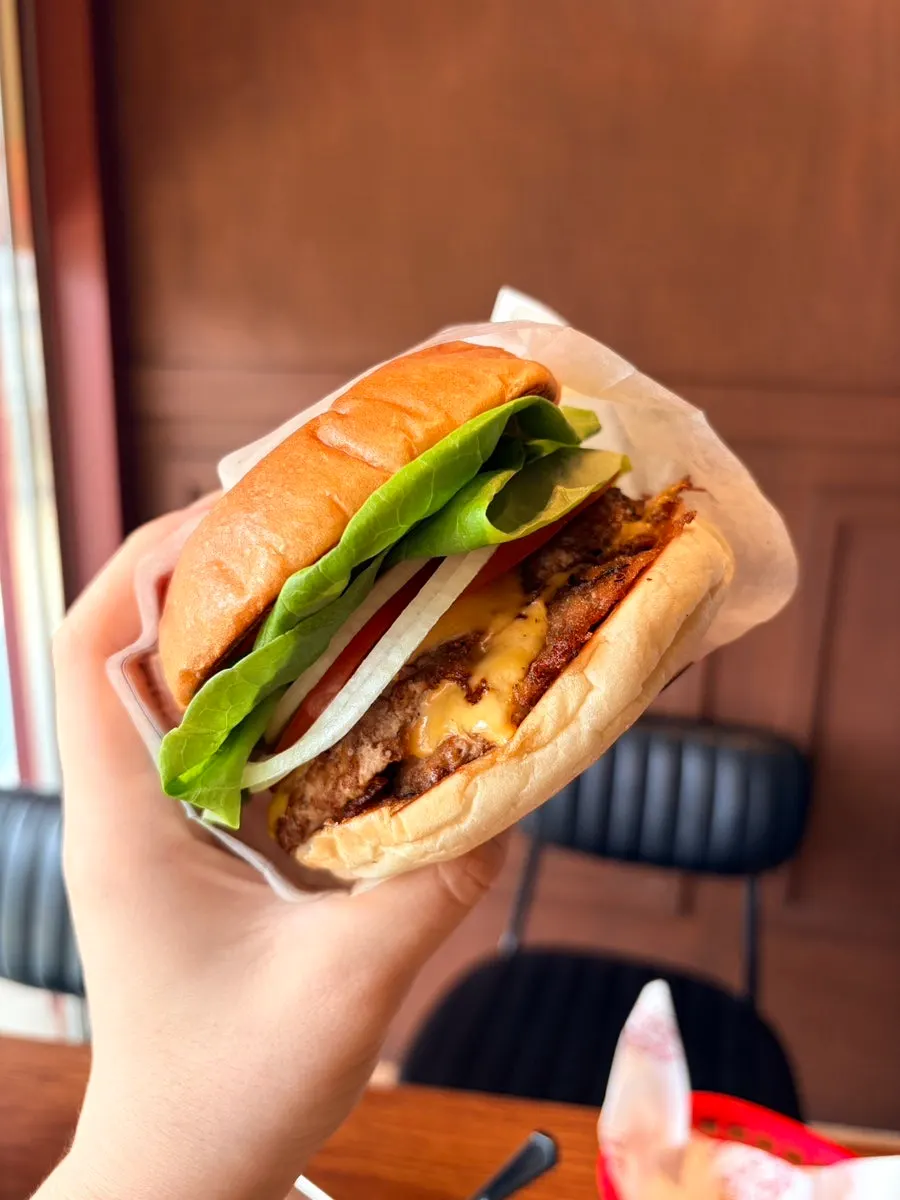 Cross-section of the Base Burger showing patty and cheddar cheese