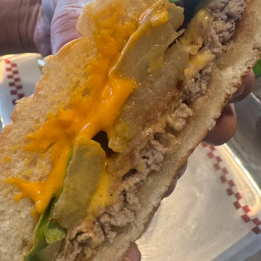 Cross-section of the Hawaiian Burger showing pineapple slices