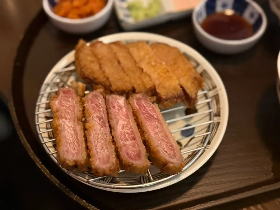 Close-up of striploin gyukatsu showing its bright pink cross-section