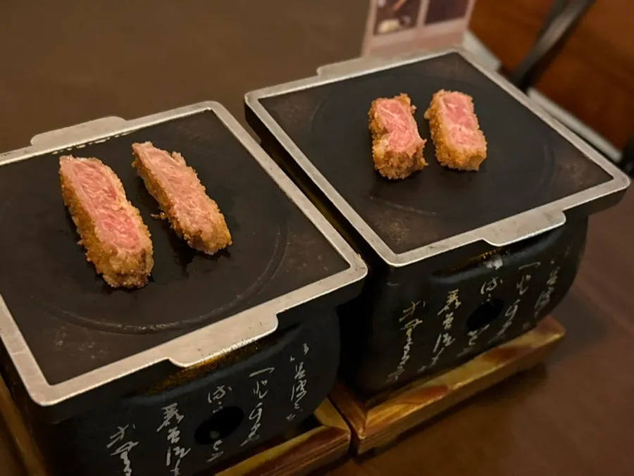 Gyukatsu being seared only on the outside on the mini grill