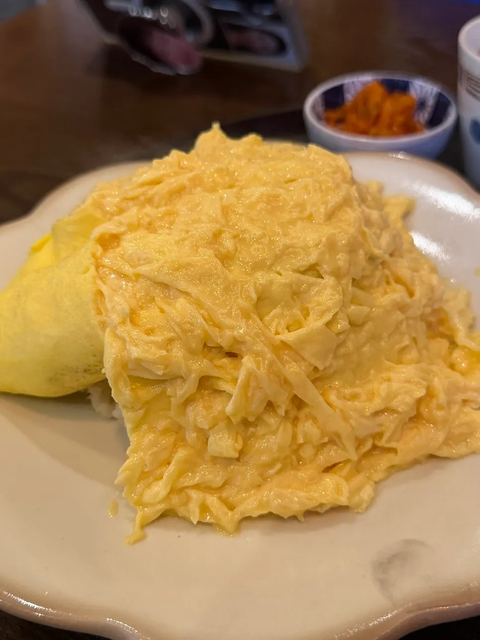Opening the egg over omurice