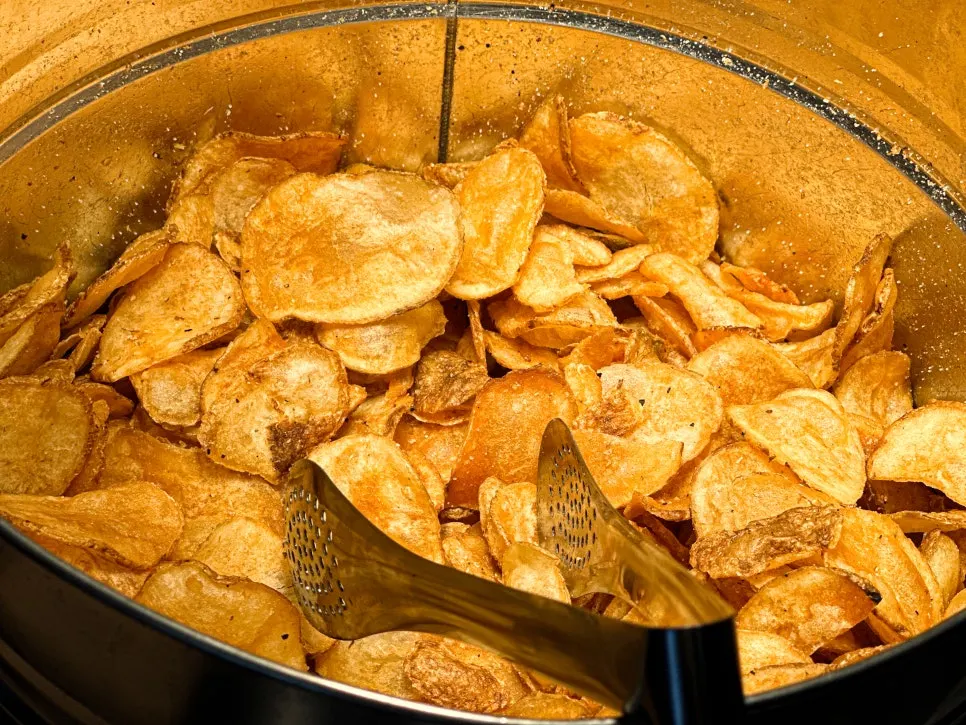 Scooping free James potato chips