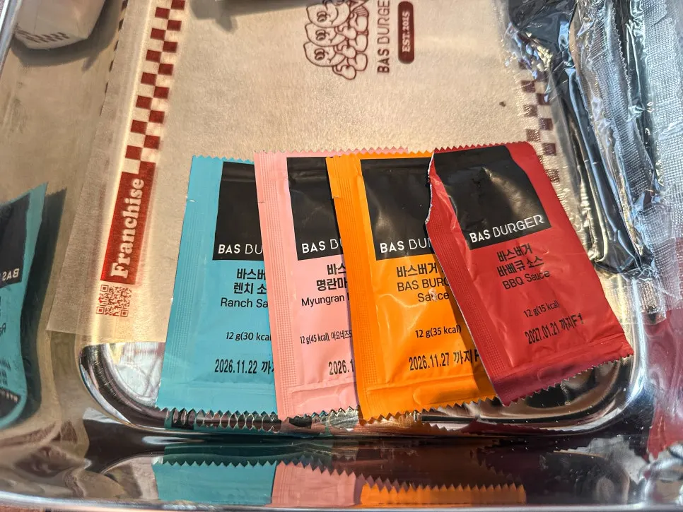 Table set with two burger sets and wings