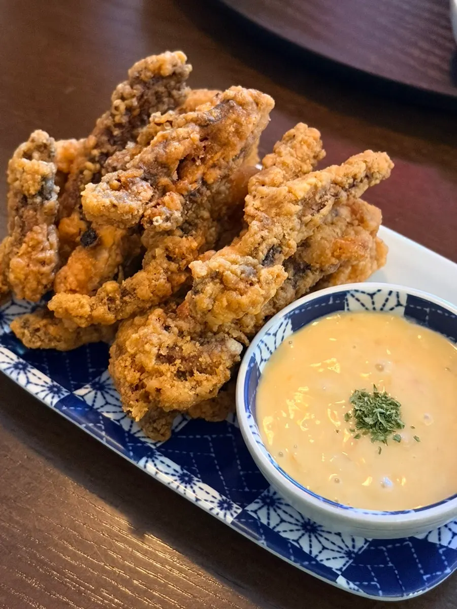 A spoonful of the udon broth