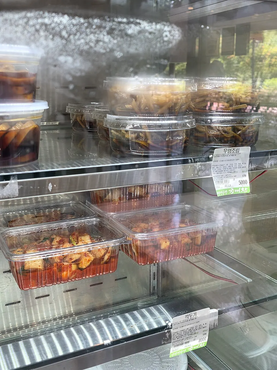 Display case filled with mild, light side dishes