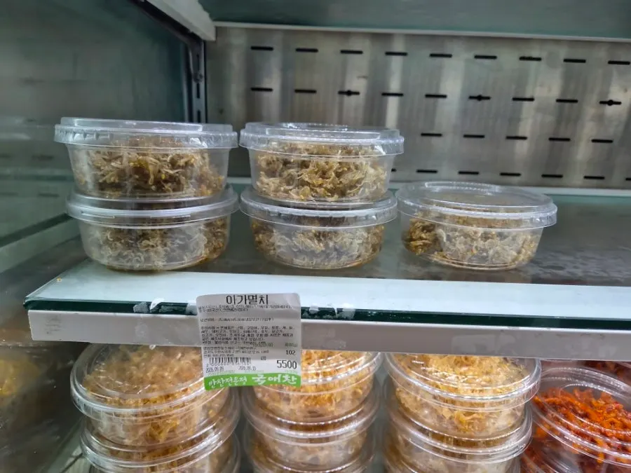 Display case stocked with a variety of side dishes