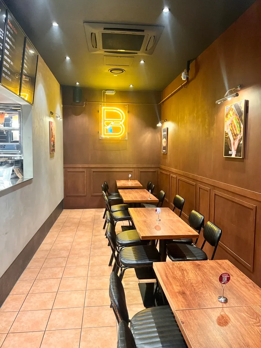 Overview of the wood-toned restaurant interior