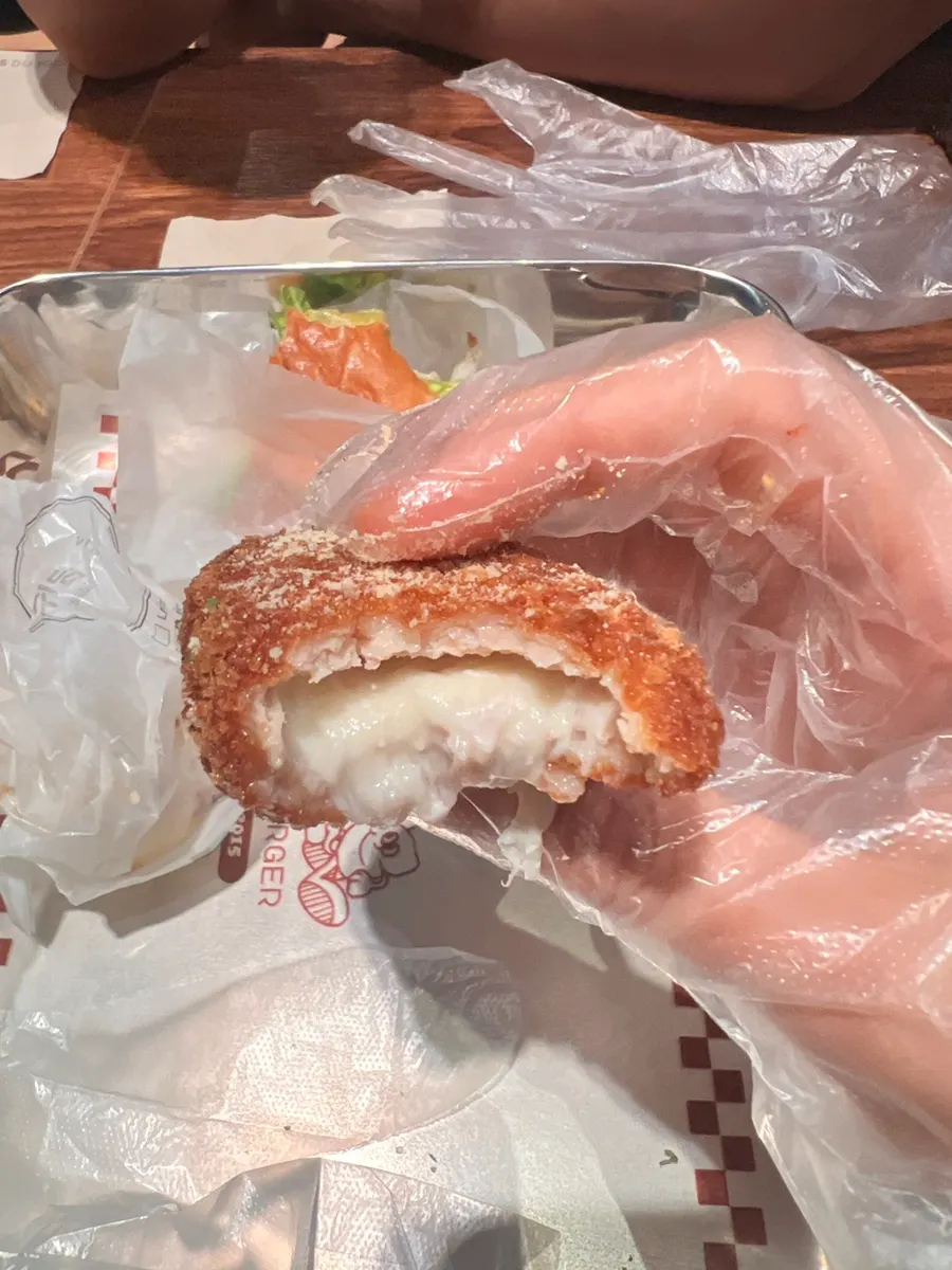 Cheese stretching from the Mozza Chicken Bites