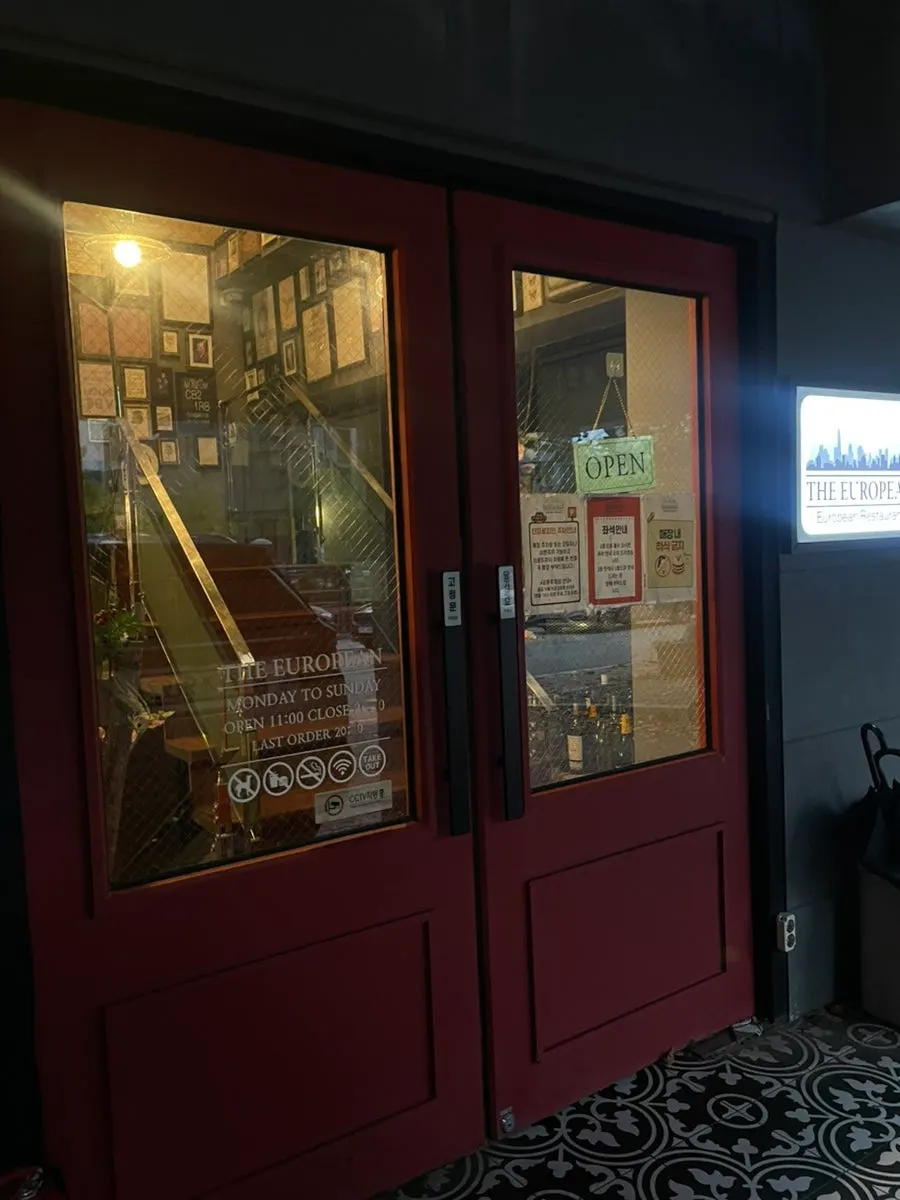 Cars parked along the Gwanggyo café street alley