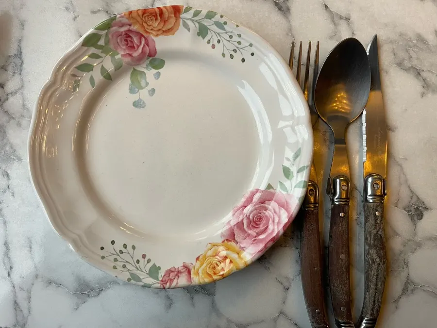 Cups, plates, and cutlery table setting