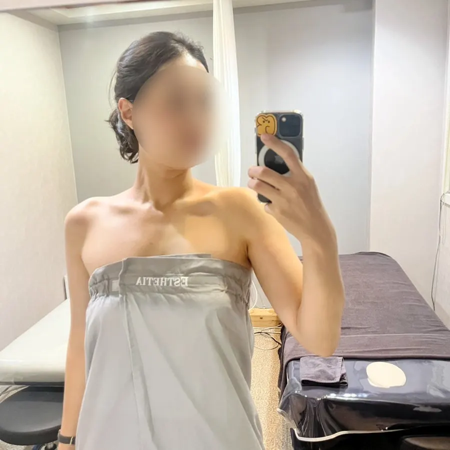 Checking the face and neck line after treatment