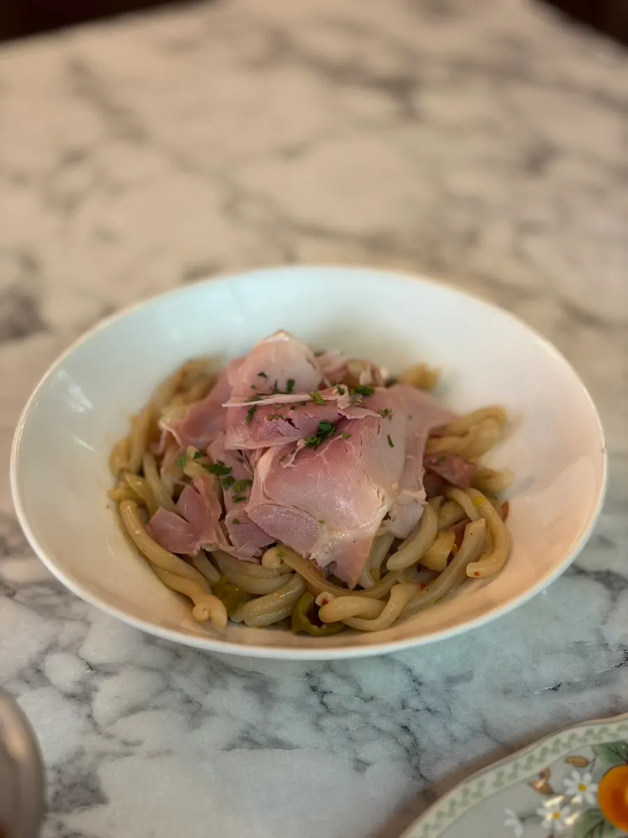 Jambon truffle funghi pizza with a soft-poached egg