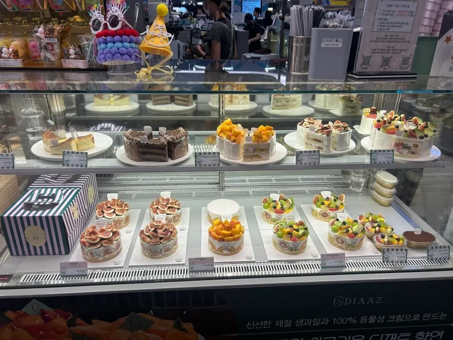 Wide view of the Café Diaz cake showcase