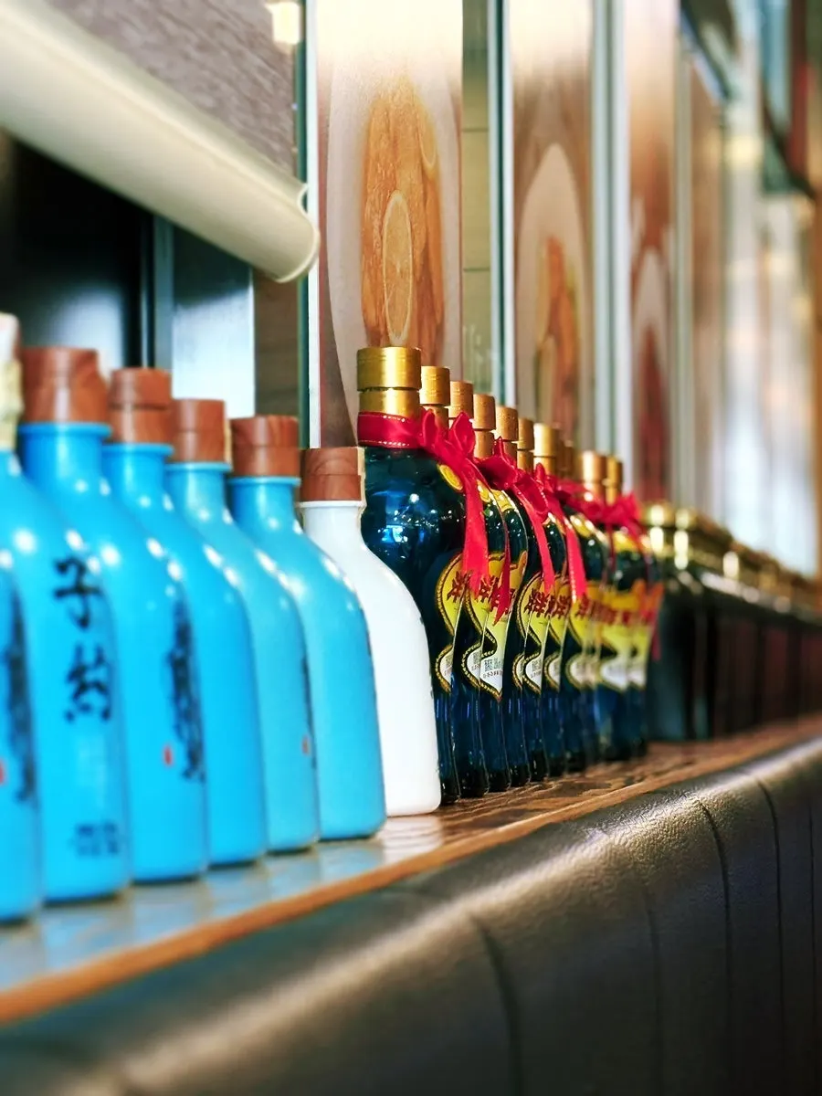 Bottles of Chinese liquor on display in the restaurant