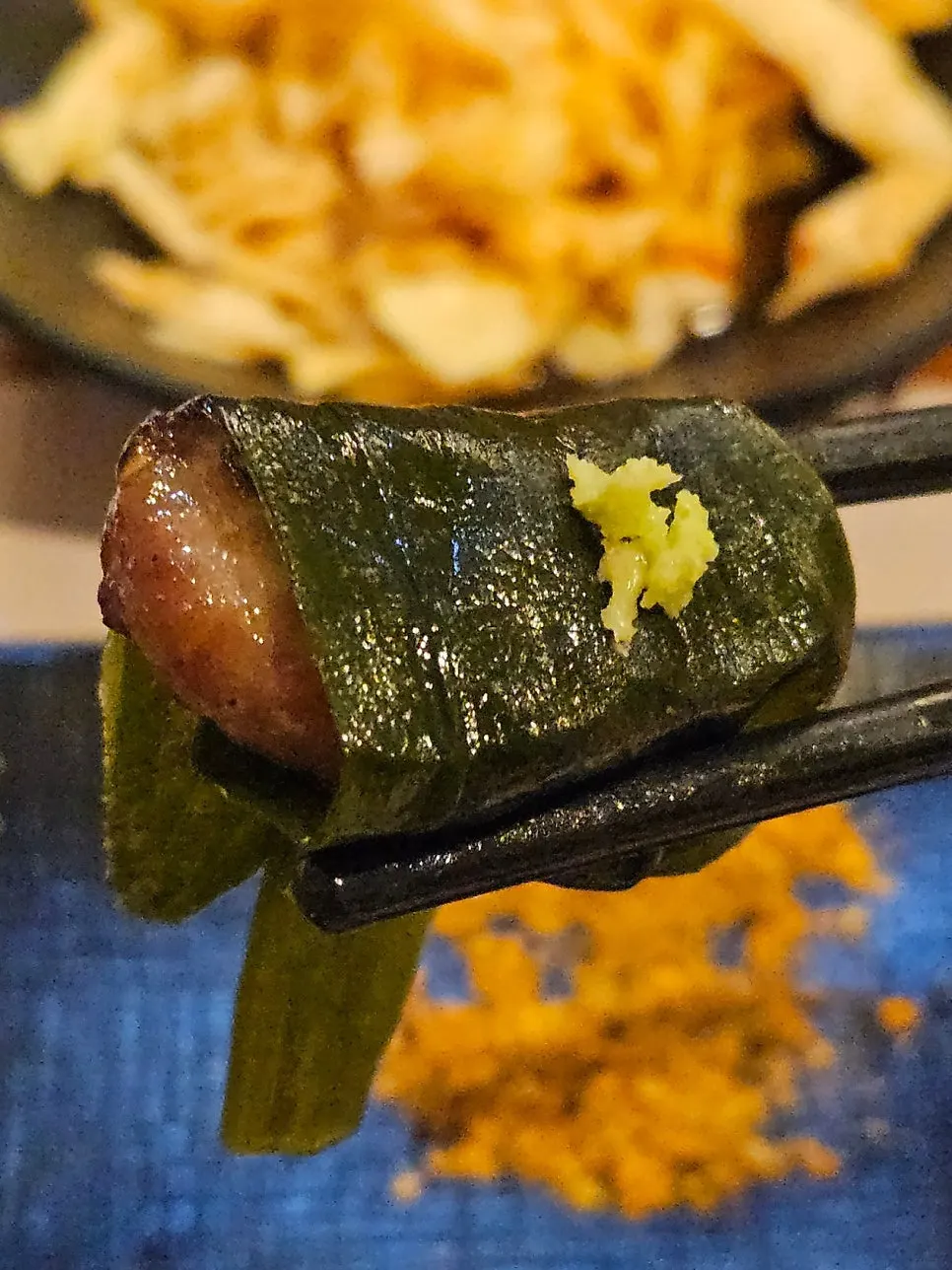 Three cuts of lamb rib grilled over charcoal