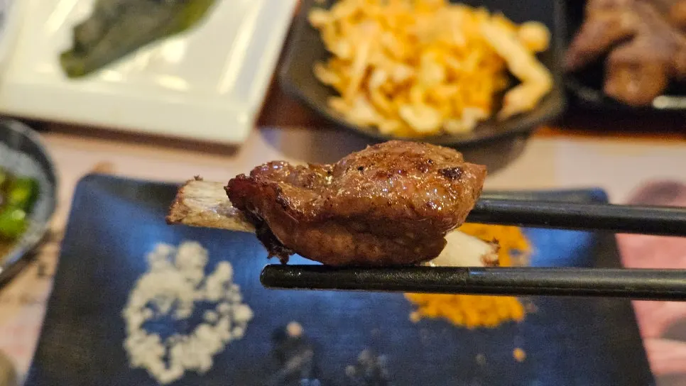 Mini lamb rib pieces on a plate