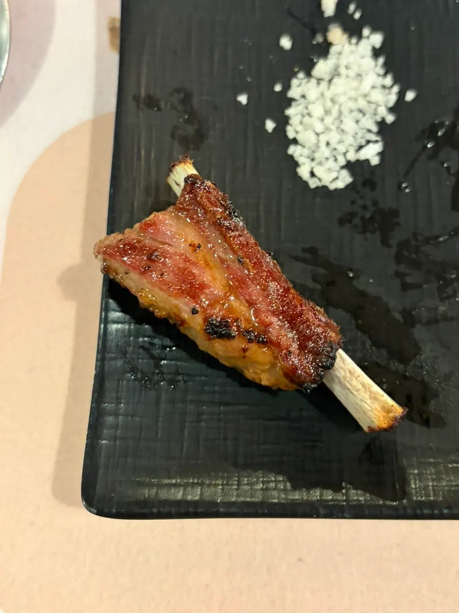 Seasoned mini rib chops before grilling