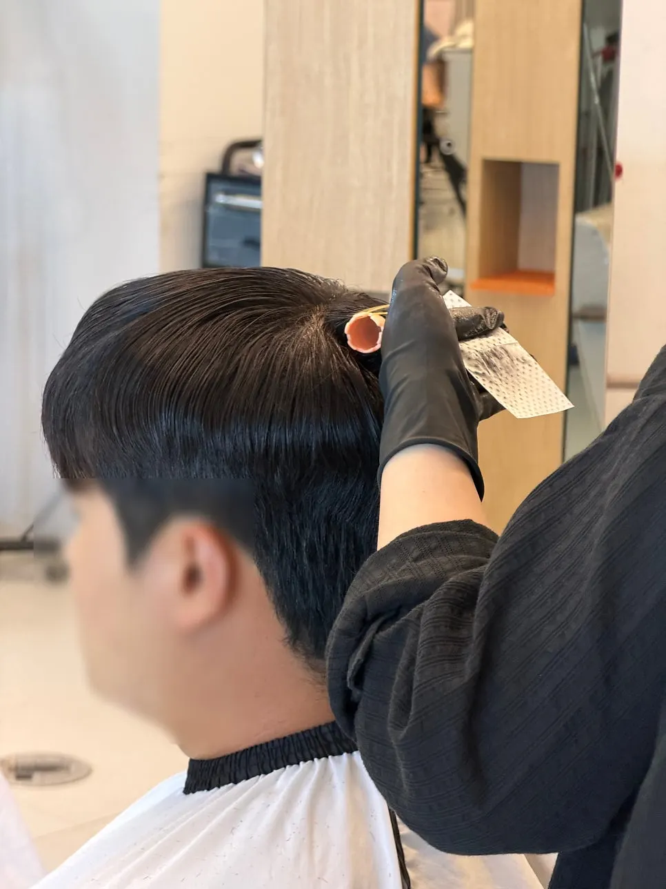 Rods being wound for the shadow perm