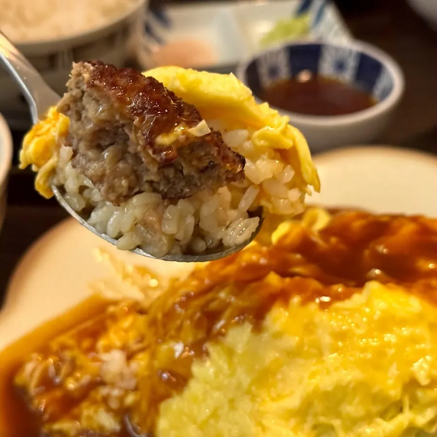 Omurice mixed with sauce