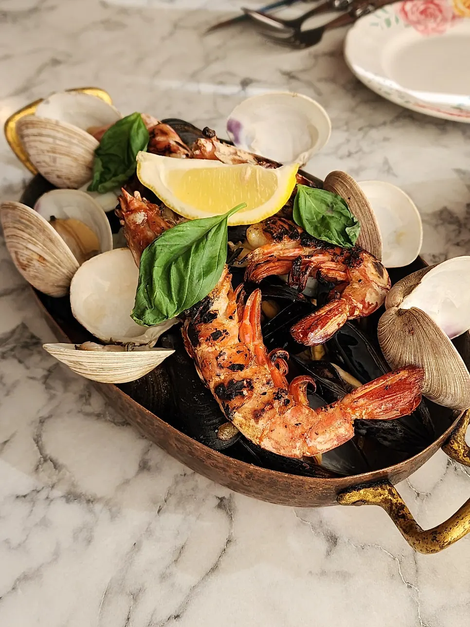 Seafood tomato pasta served first