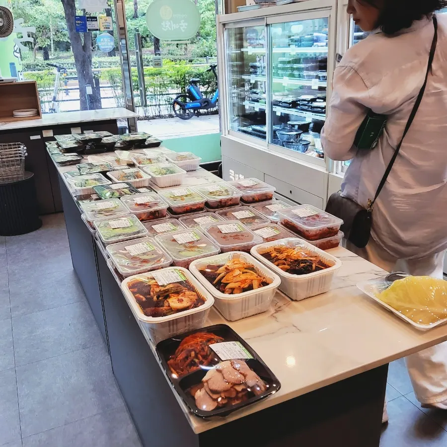 Various handmade side dishes on display at Gukaechan