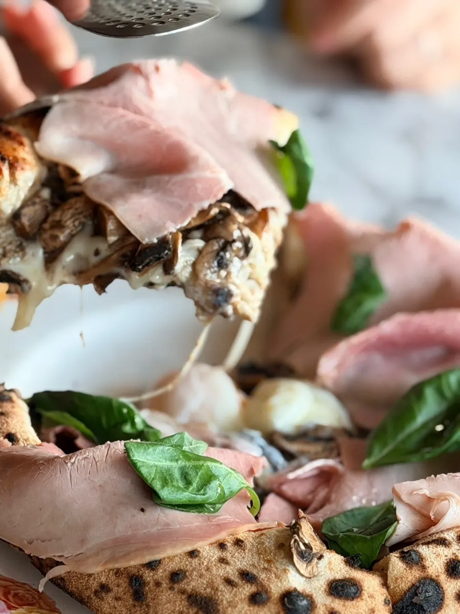 Photo of pizza topped with several ingredients