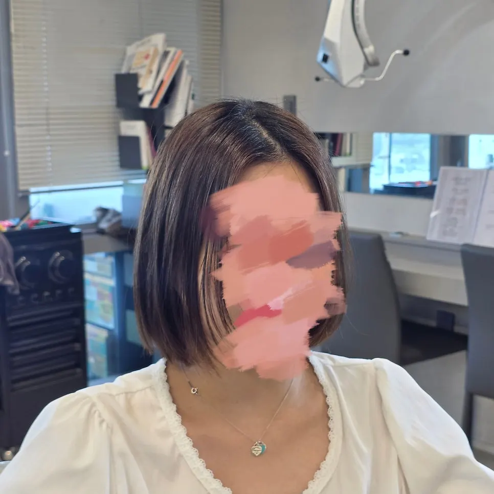 Hair after the cut, finished with a blow-dry