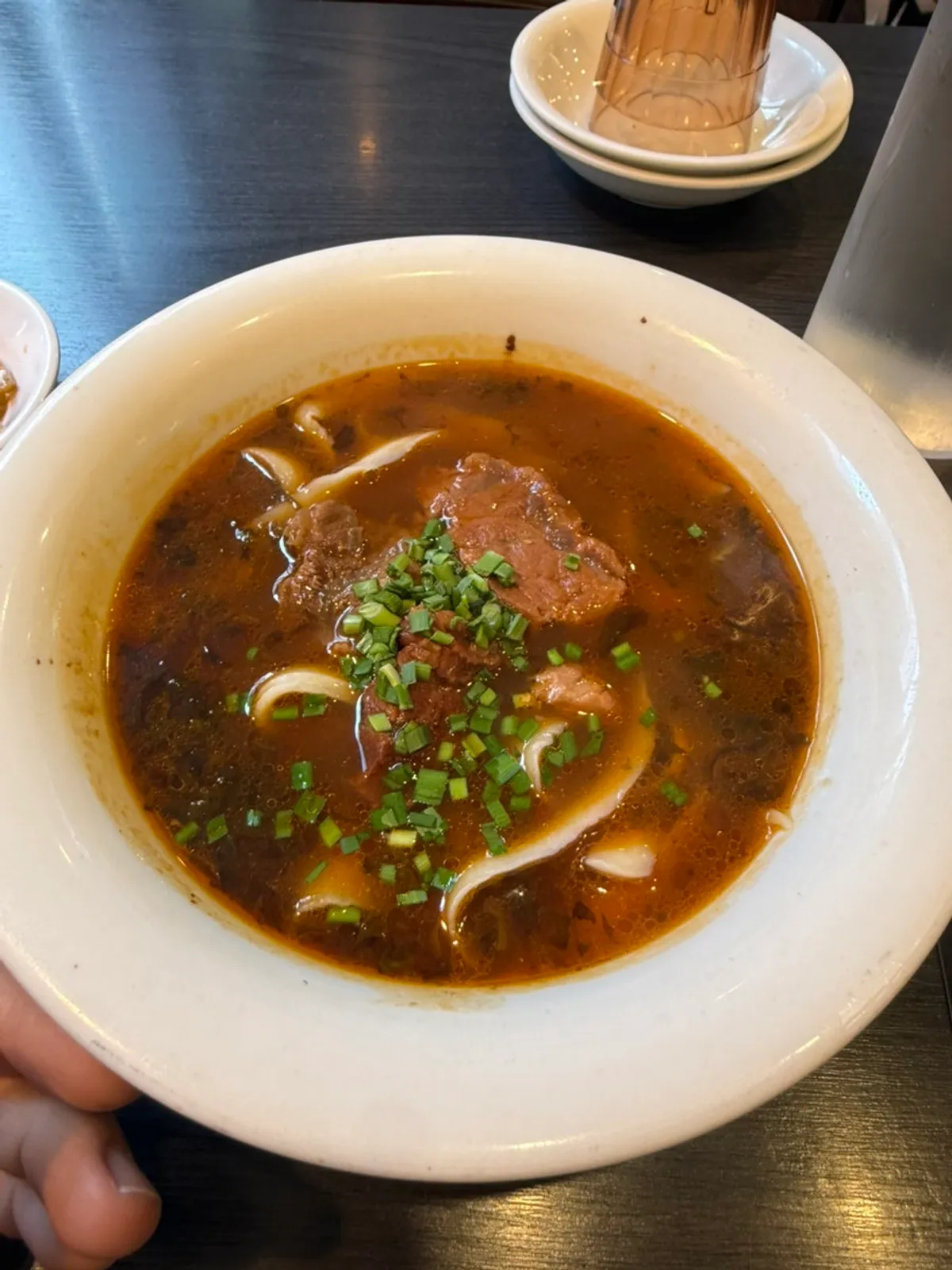 A bowl of rich-broth uyuk dosakmyeon
