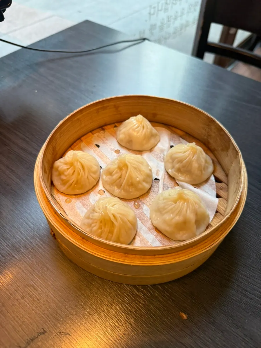 Xiaolongbao picked up with chopsticks
