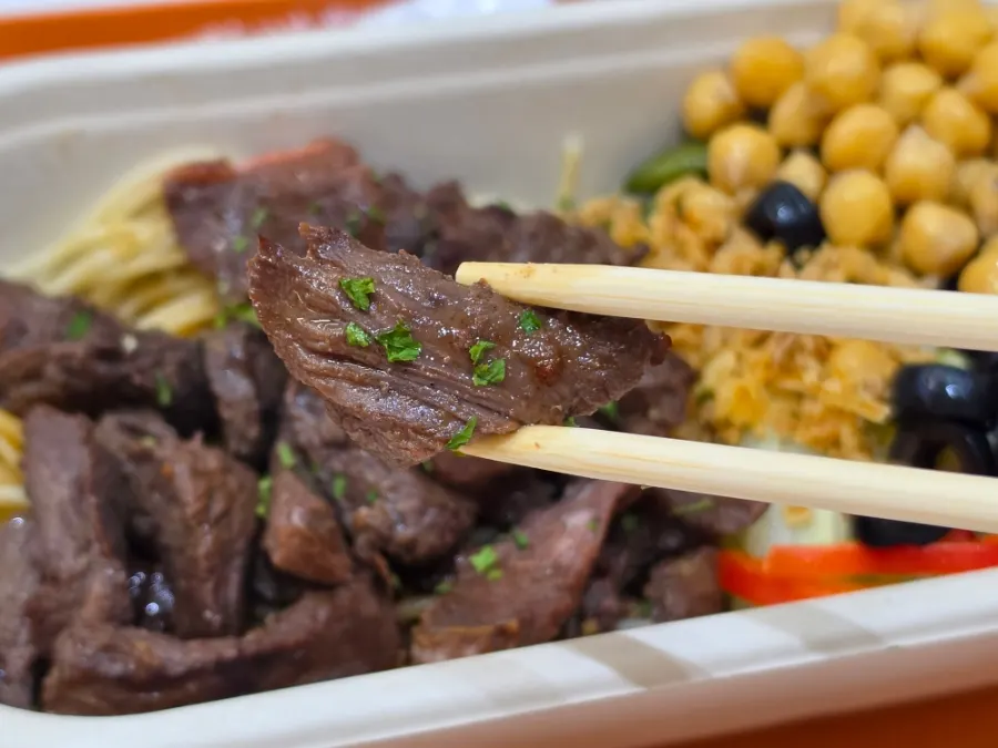Generous serving of seasoned beef topping
