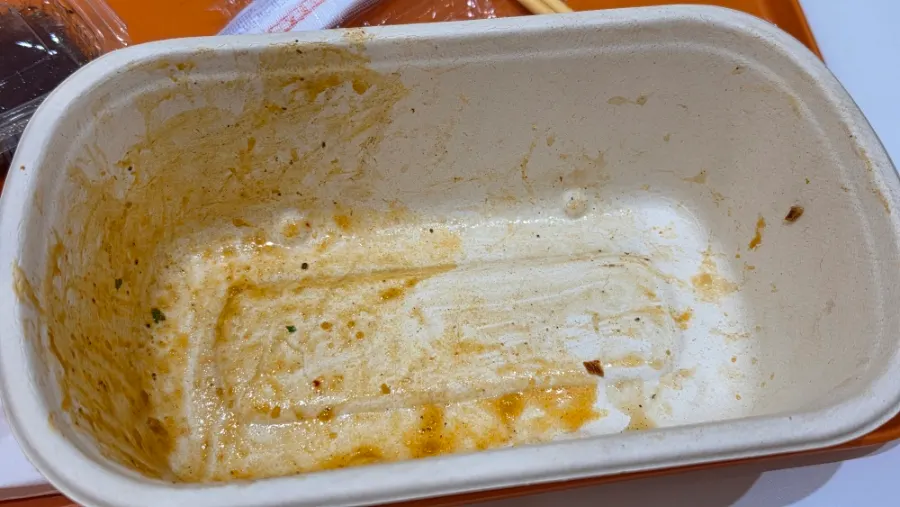 Finished, emptied protein box on the table