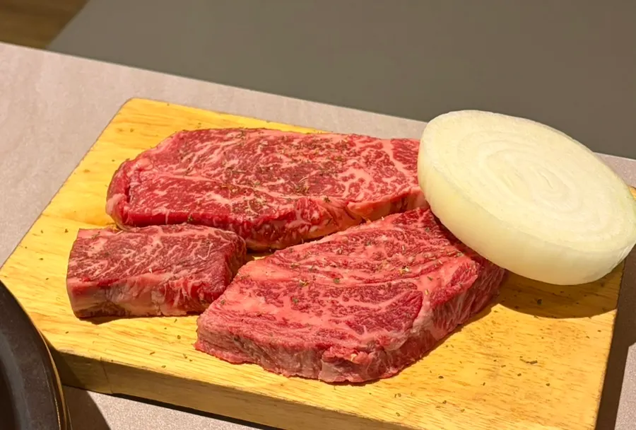 Raw black beef sirloin on a plate