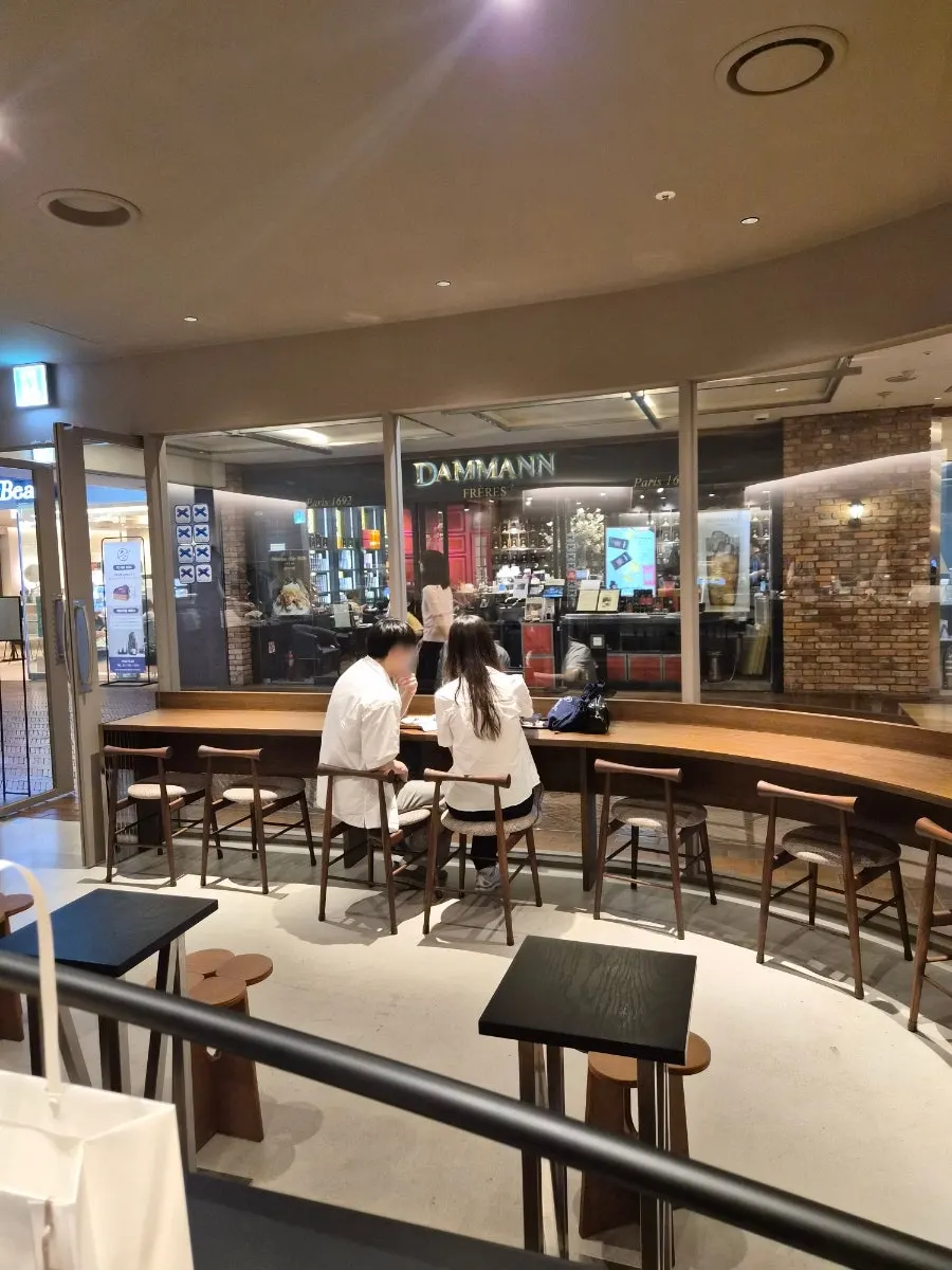 Bar-style seats at Center Coffee facing the window