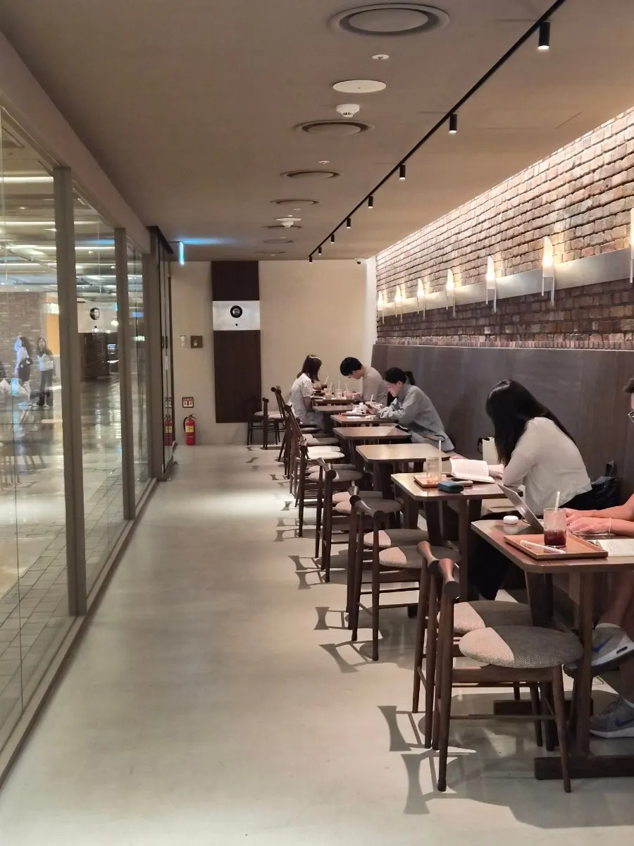Seating next to the full glass window at Center Coffee Gwanghwamun