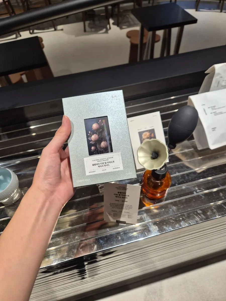 Coffee bean packages on display for smelling