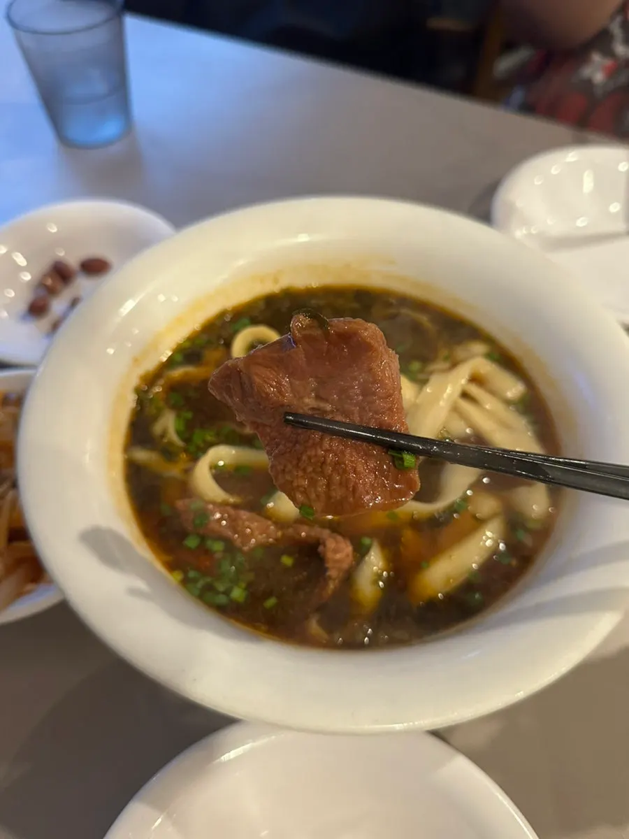 Dosakmyeon noodles mixed with the broth