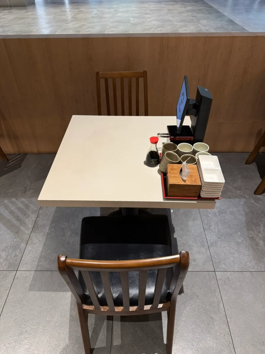 Bar seats and 2-seat tables at Elephant Sushi