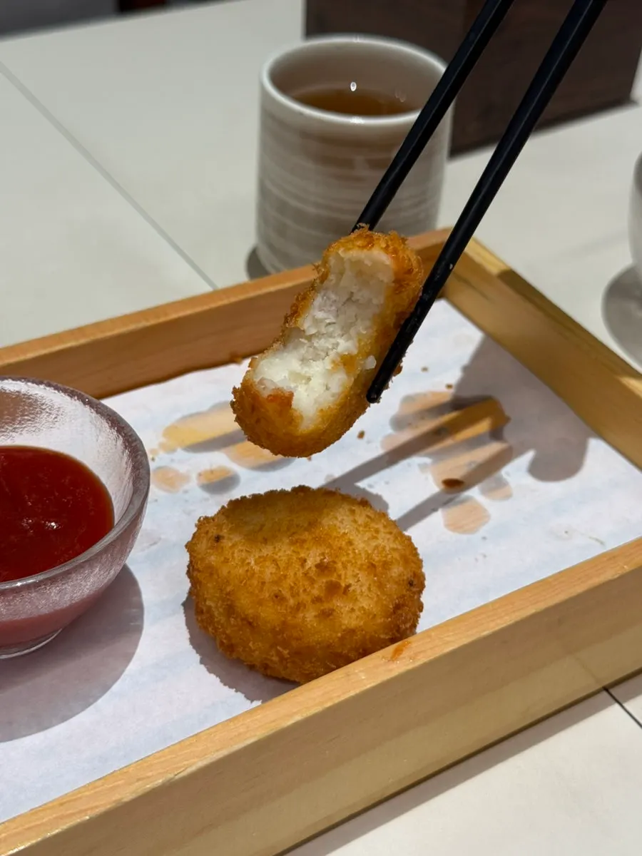 Cross-section of the halved potato croquette