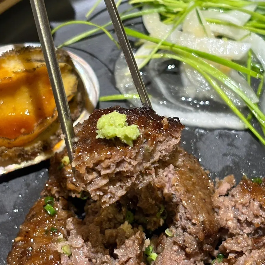 Golden tteokgalbi with accompaniments