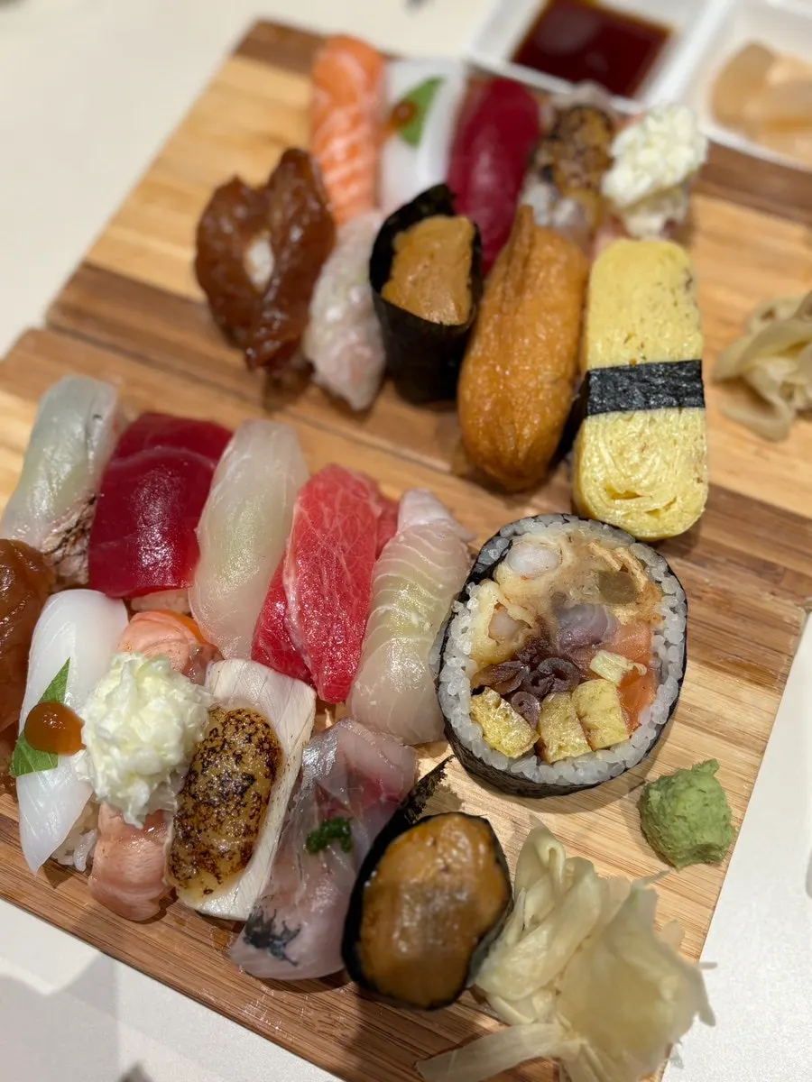Sushi selection including ankimo and shima aji