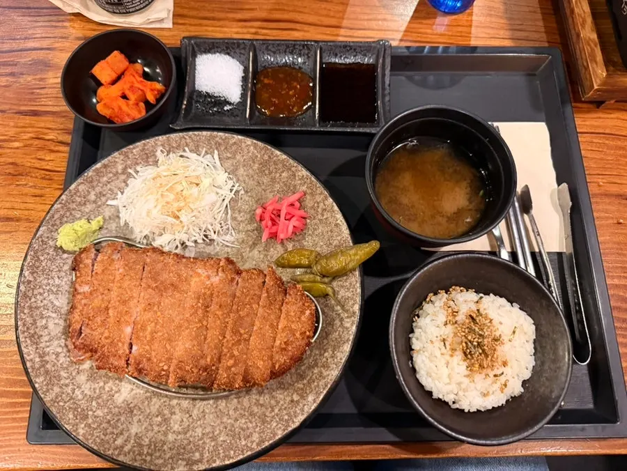 Table setting of fried Japanese-style beef gyukatsu