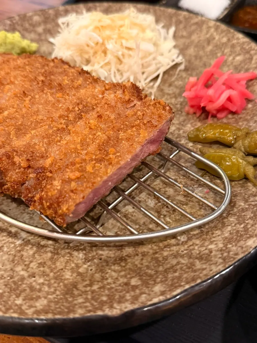 Cross-section of sirloin gyukatsu served medium-rare