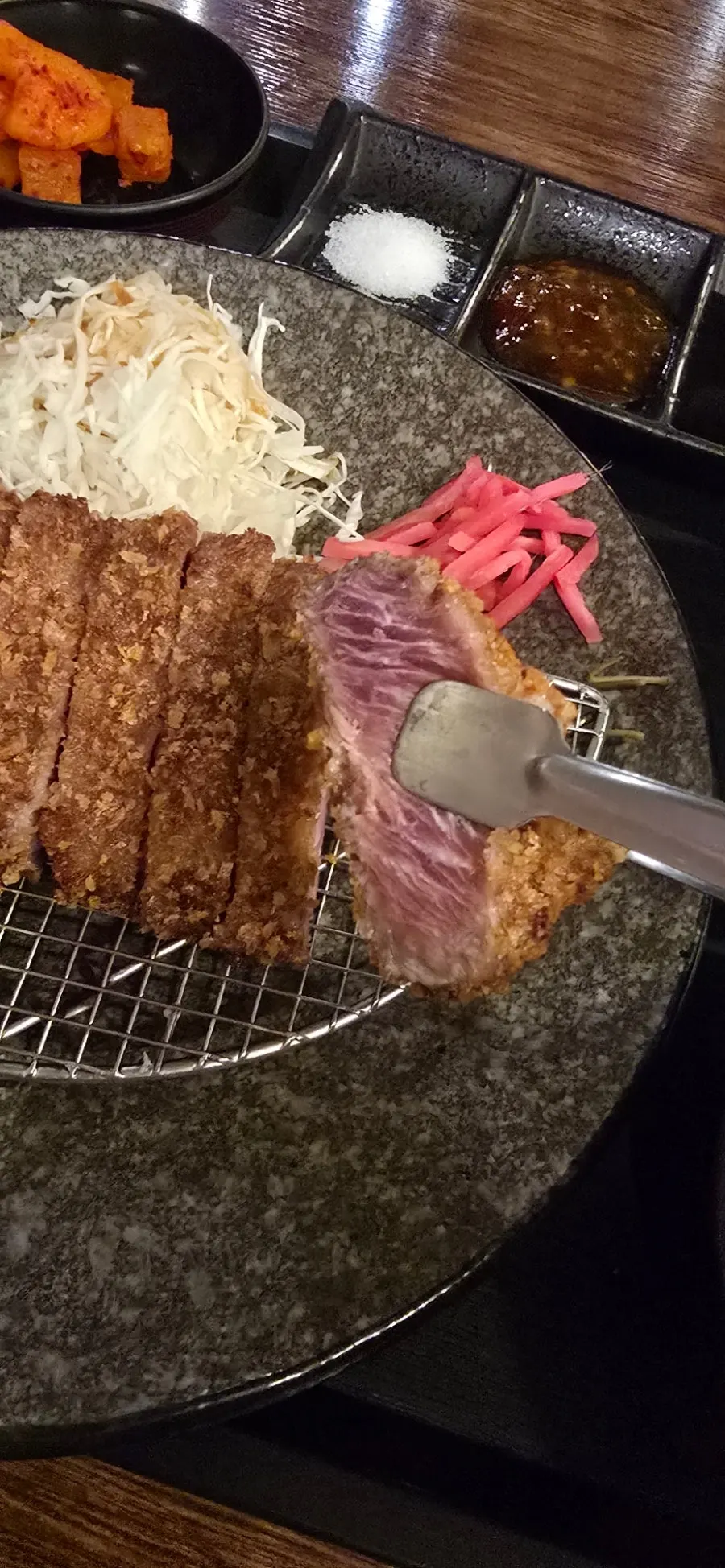 Cross-section of raw breaded gyukatsu meat