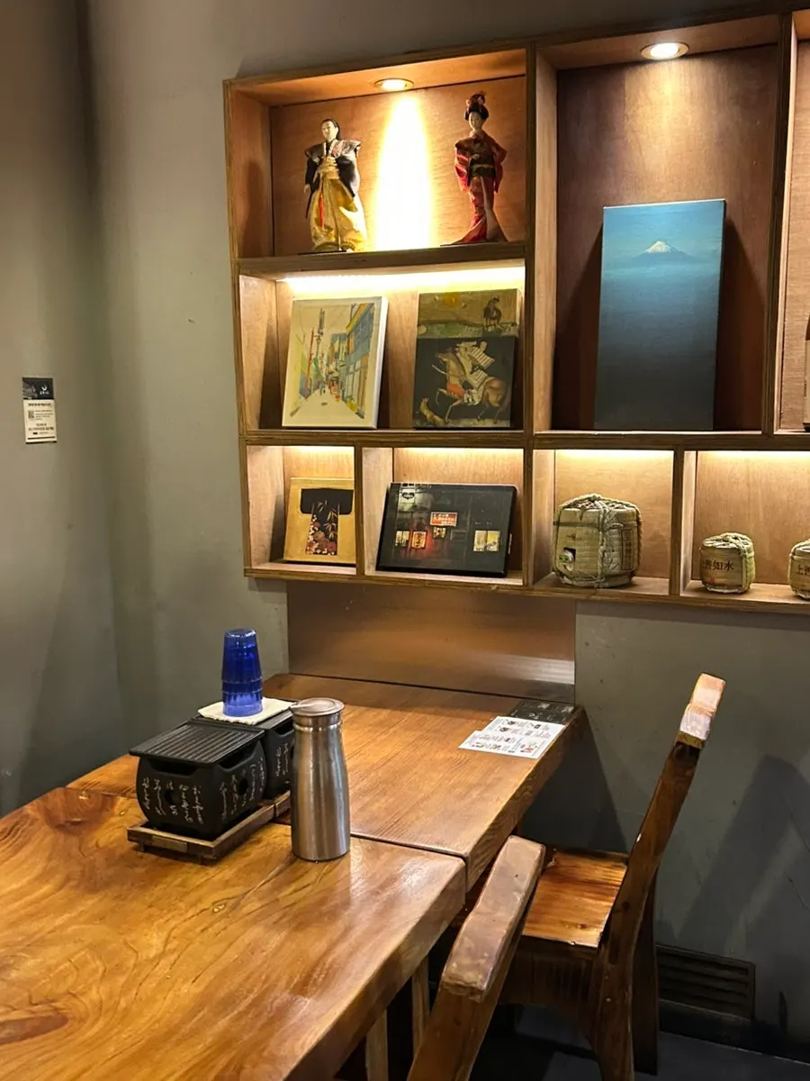 Hurato Sikdang interior with reservation information posted