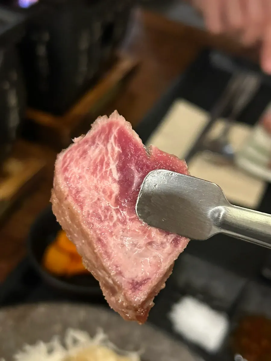 Gyusteki beef cooking on the grill